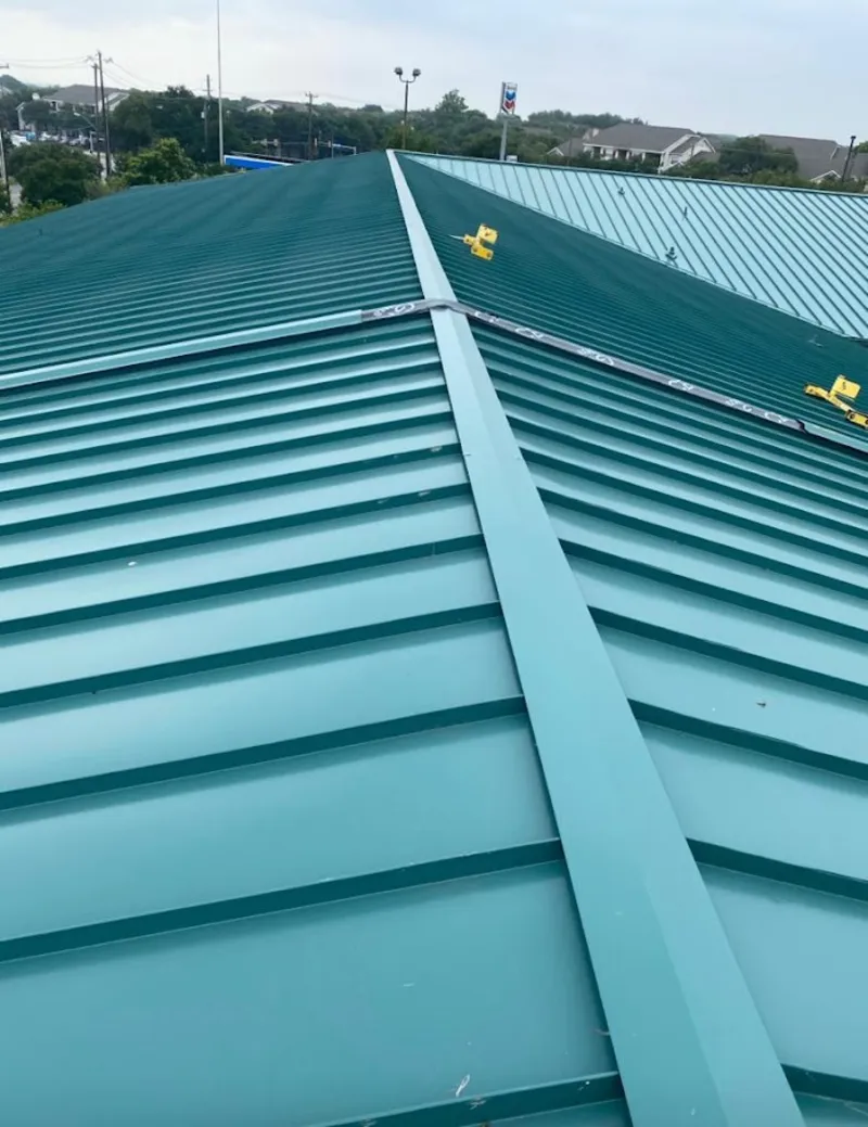 Green commercial metal roof ridge and valley for Metal Roof Repair in Villas